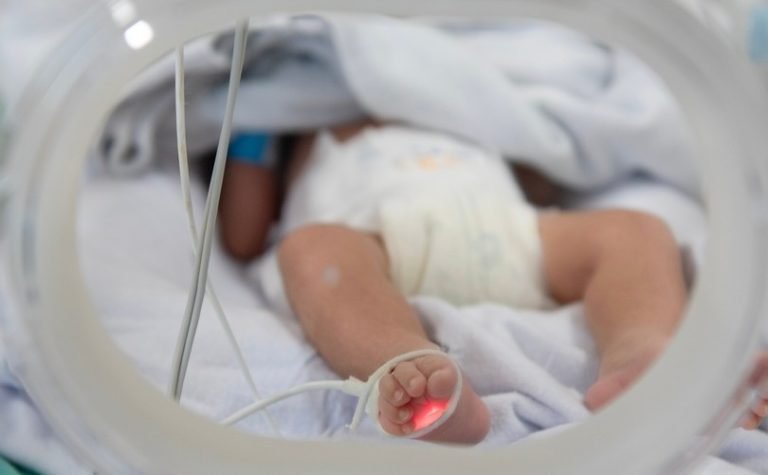 Couple receives custody of baby they wanted surrogate to abort