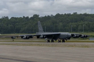 A U.S. Air Force B-52H Stratofortress lands at Joint Base Elmendorf-Richardson, Alaska, on August 5, 2026, ahead of the Arctic Thunder Open House. The long-range strategic bomber is undergoing major modernization toward the future B-52J configuration, including Rolls-Royce F130 engines and a new AESA radar intended to keep the aircraft operational into the 2050s and beyond.