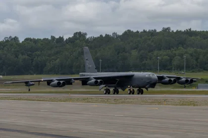 A U.S. Air Force B-52H Stratofortress lands at Joint Base Elmendorf-Richardson, Alaska, on August 5, 2026, ahead of the Arctic Thunder Open House. The long-range strategic bomber is undergoing major modernization toward the future B-52J configuration, including Rolls-Royce F130 engines and a new AESA radar intended to keep the aircraft operational into the 2050s and beyond.