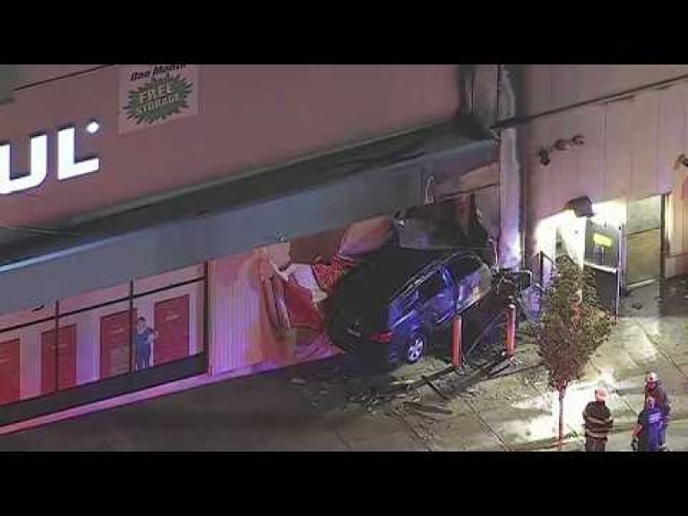 Shocking Crash: SUV Plows Directly Into Kensington U Haul Building Wall