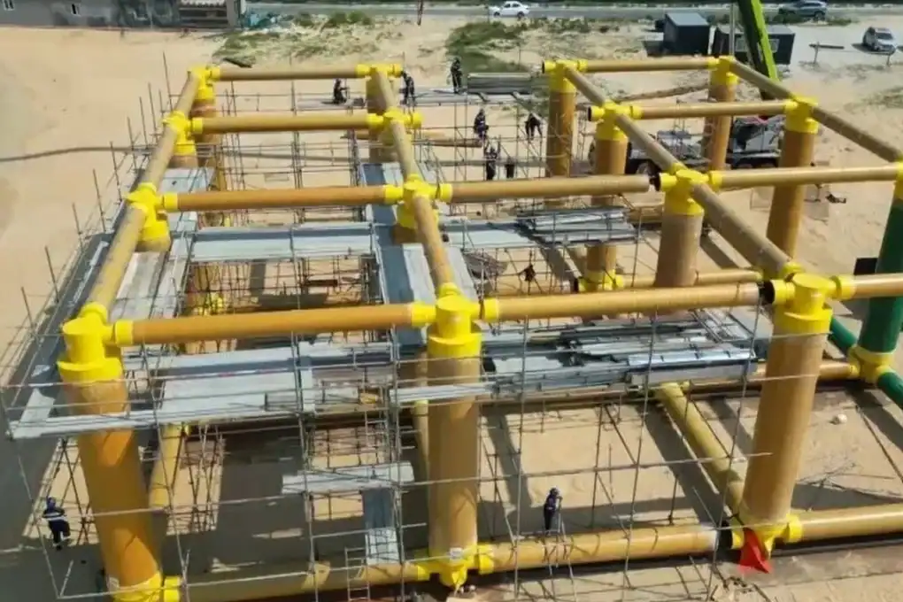 Image of modular grid structure under construction made from the bamboo composite material